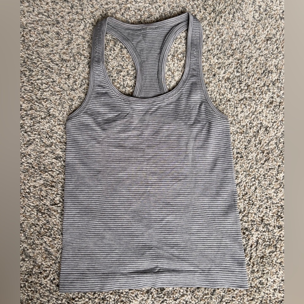 Black and grey lululemon swiftly tank top race length